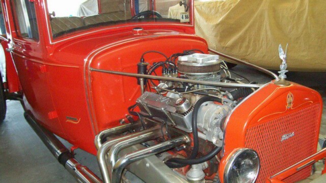 Red vintage hot rod car engine.