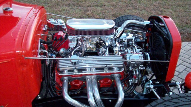 Red hot rod's custom engine detail.