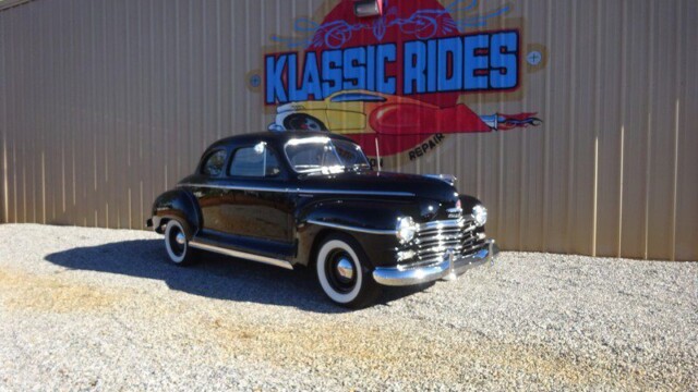 Black classic car at Klassic Rides.