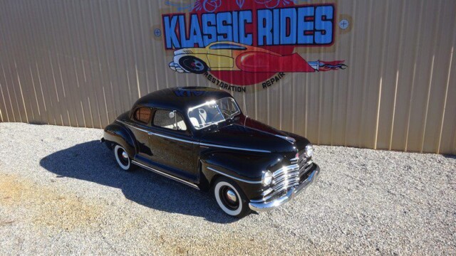 Black classic car at Klassic Rides.