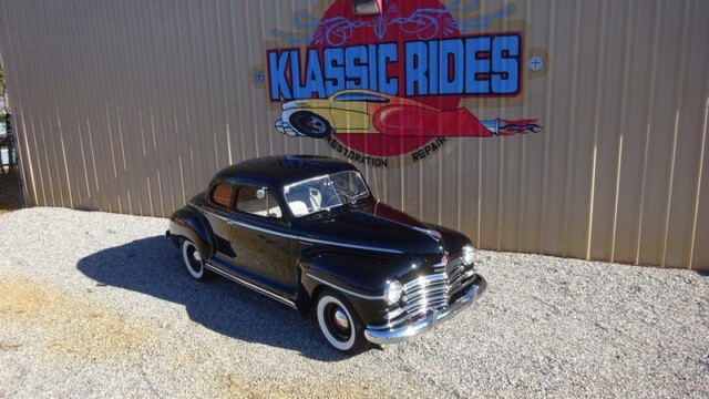 Black classic car at Klassic Rides.