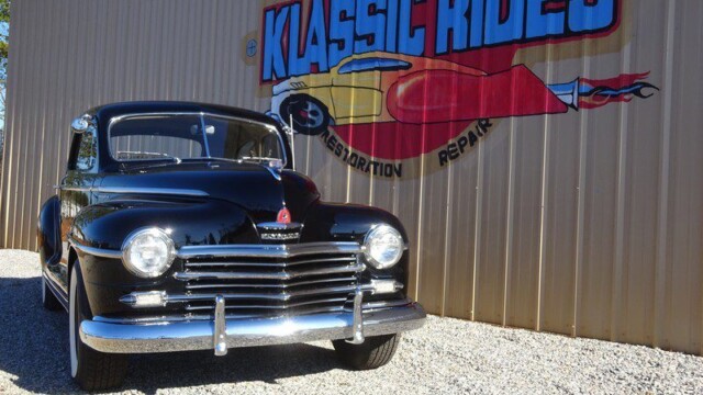Black classic car at Klassic Rides.