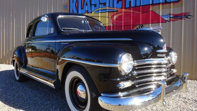 Black 1948 Plymouth coupe classic car.