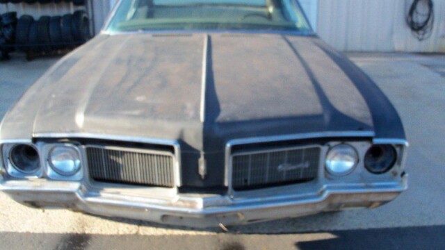 Here's an alt tag for the image: Oldsmobile Cutlass project car front view.