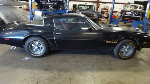 Black Pontiac Trans Am muscle car.