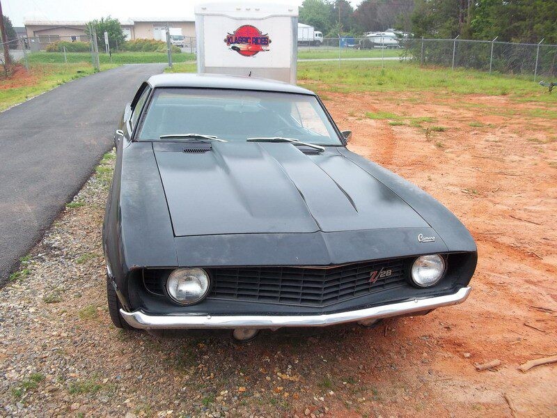 Black 1969 Camaro Z28 muscle car.