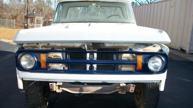 White vintage Dodge Power Wagon truck.