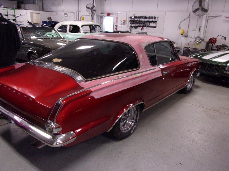 Red Plymouth Barracuda restoration project.