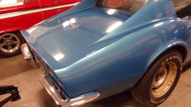 Blue classic Corvette rear view.