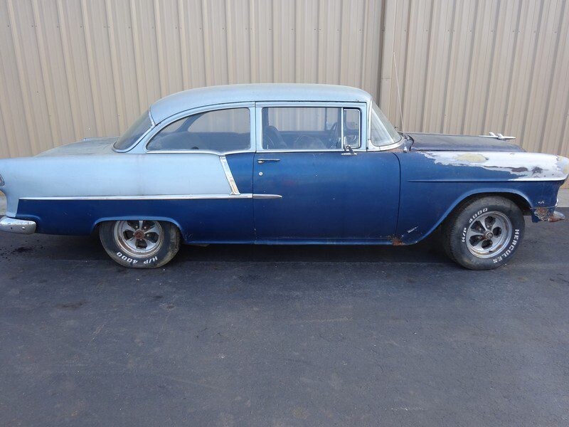Blue and silver 1955 Chevy project car.