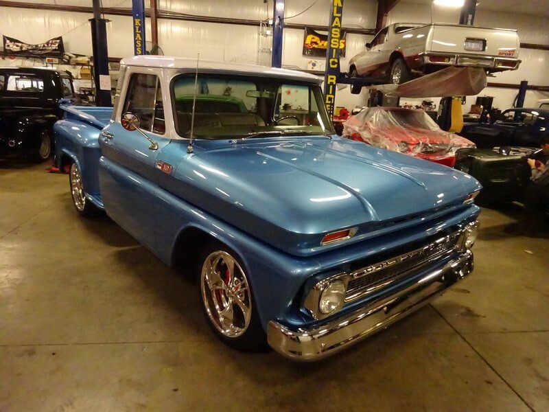 Blue classic Chevrolet C10 pickup truck.