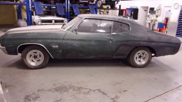 Dusty green Chevrolet SS muscle car.
