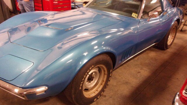 Blue classic Corvette sports car.