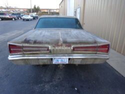 Dusty vintage Dodge Coronet rear view.
