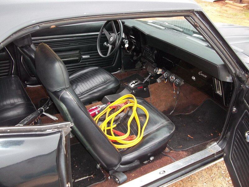 Black classic Camaro car interior.