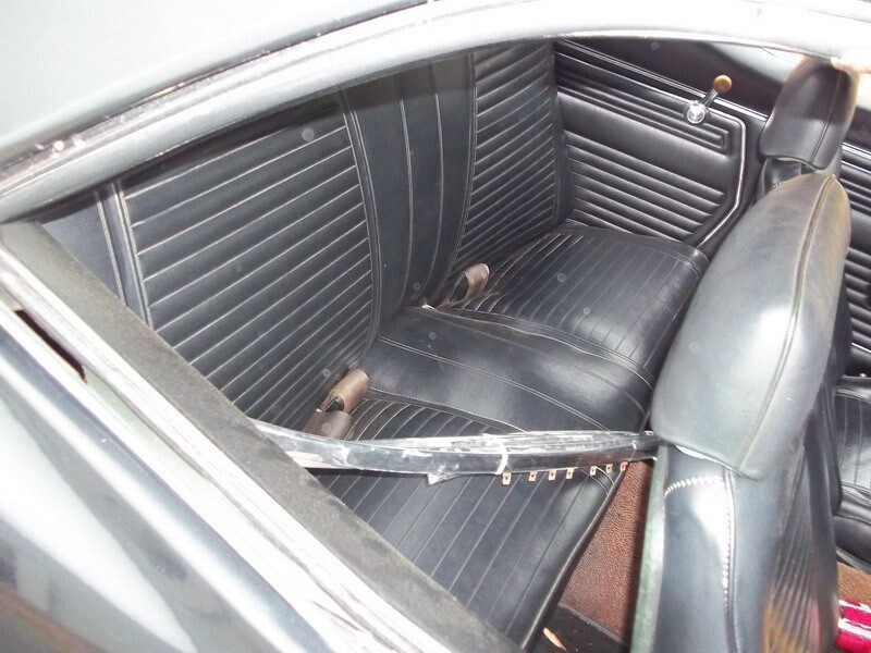 Classic car's black leather interior.