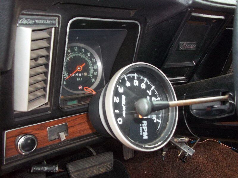 Classic car speedometer and tachometer.