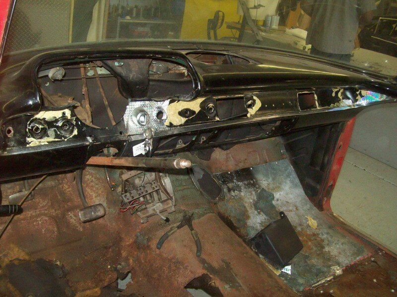 Rusty classic car interior restoration.