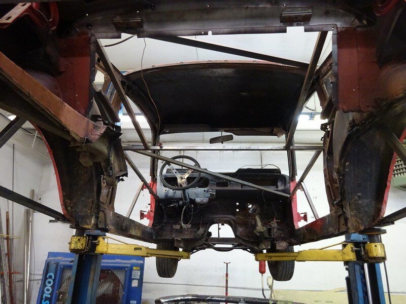 Classic car undergoing restoration.