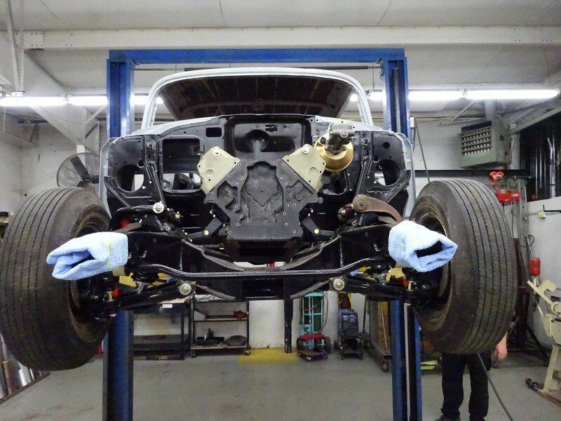 Classic car chassis under restoration.