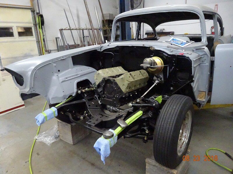 Classic car engine restoration in progress.