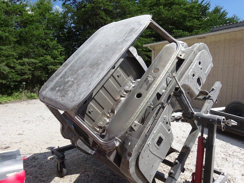 Car body shell in preparation for paint.