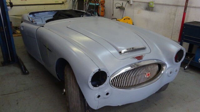 Grey Austin-Healey in restoration.