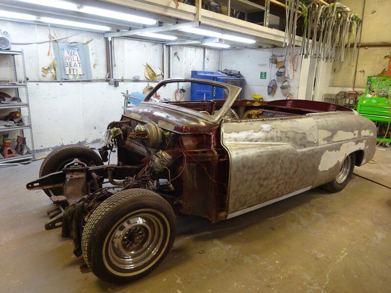 Classic car body under restoration.