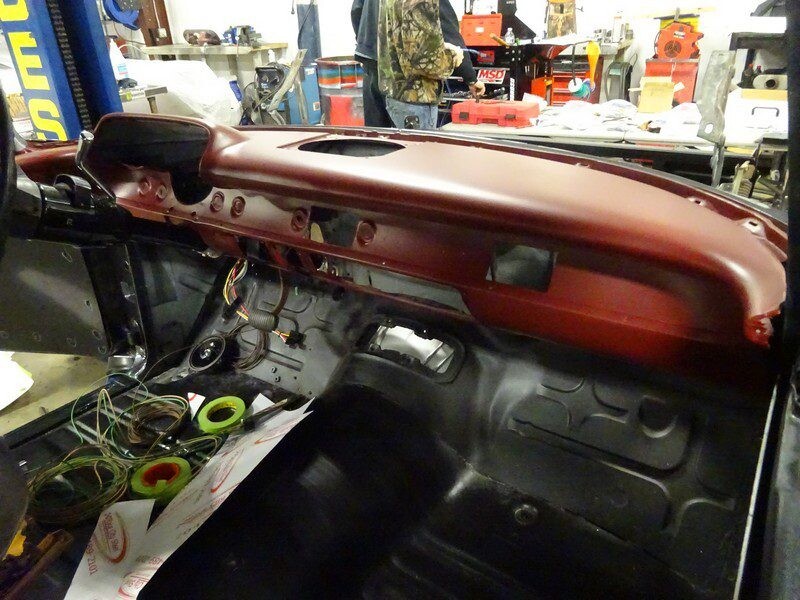 Classic car dashboard restoration in progress.