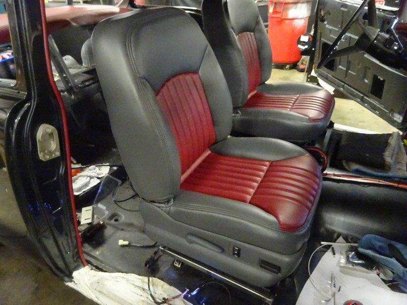 Red and gray car interior seats.