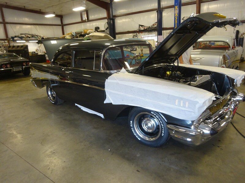 Dark gray 1957 Chevy Bel Air restoration.