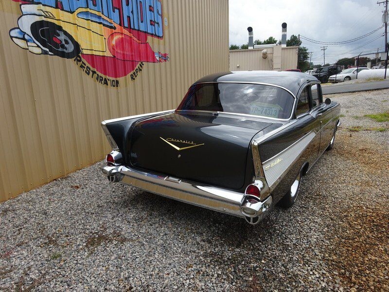 Here's an alt tag for the image: Black 1957 Chevrolet Bel Air.