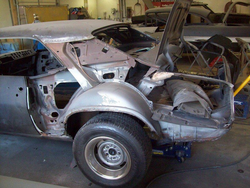 Classic car undergoing restoration.
