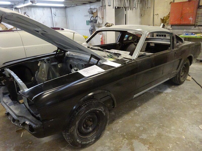 Black Ford Mustang restoration project.