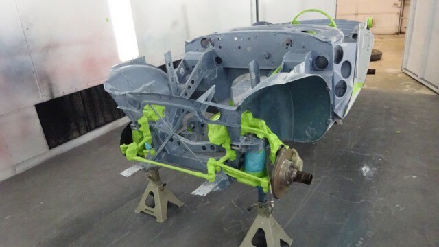 Classic car body, primed and ready for paint.