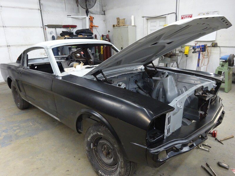 Black Ford Mustang restoration project.