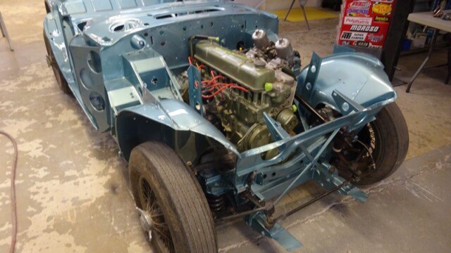 Classic car chassis under restoration.