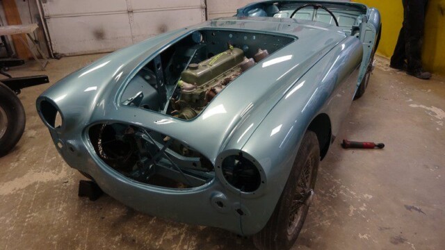 Here's an alt tag for the image: Blue Austin-Healey 3000 restoration.