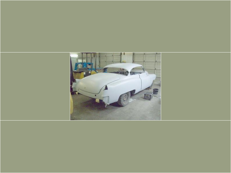 Here's an alt tag for the image: `Classic Cadillac coupe, bodywork in progress`