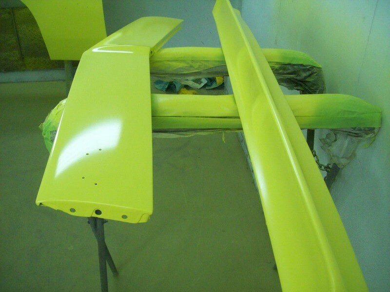 Freshly painted car body parts.