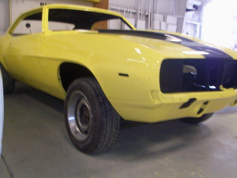 Yellow Camaro muscle car in progress.