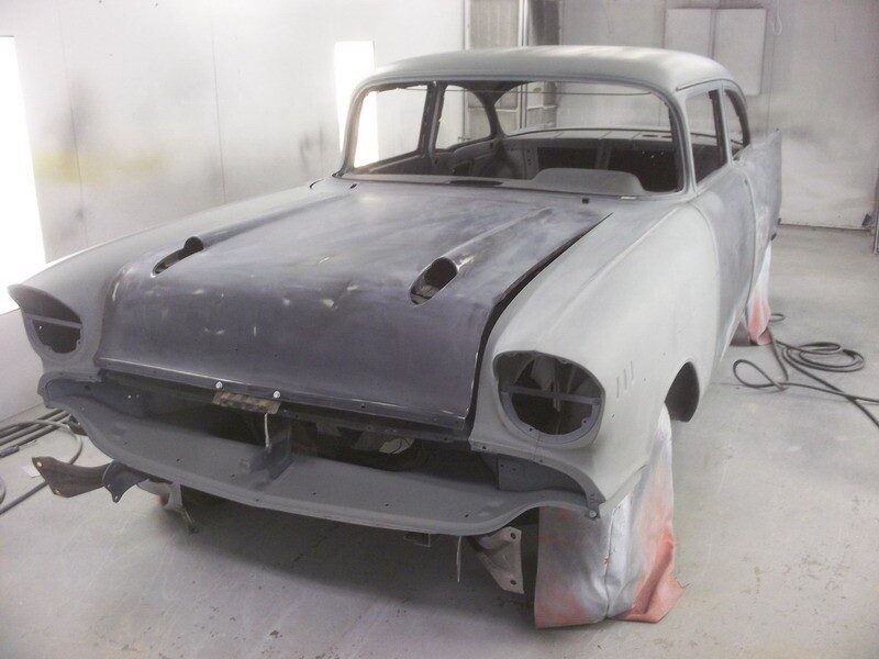 Primered 1955 Chevy Bel Air body.