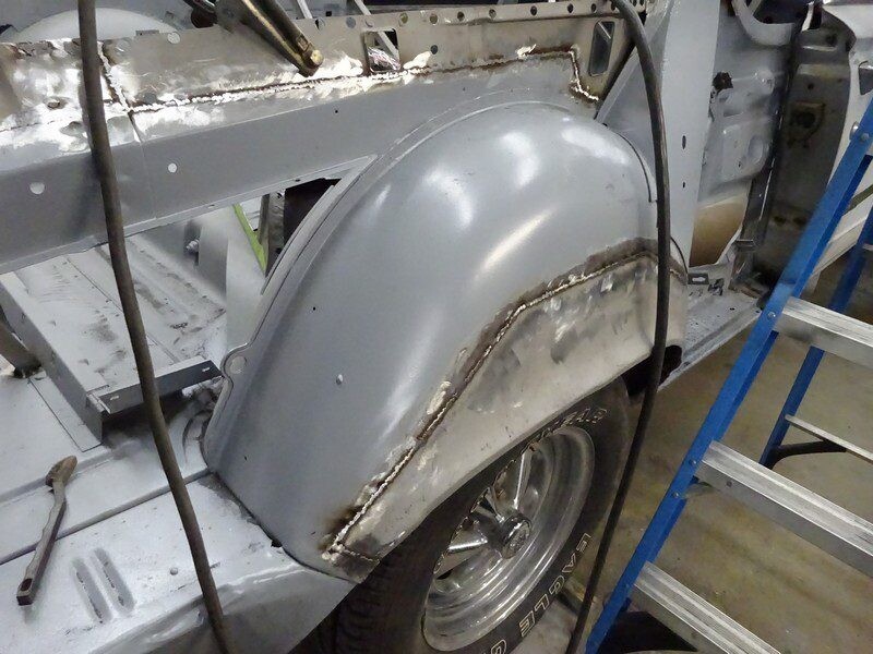 Car body repair, rear quarter panel welding.