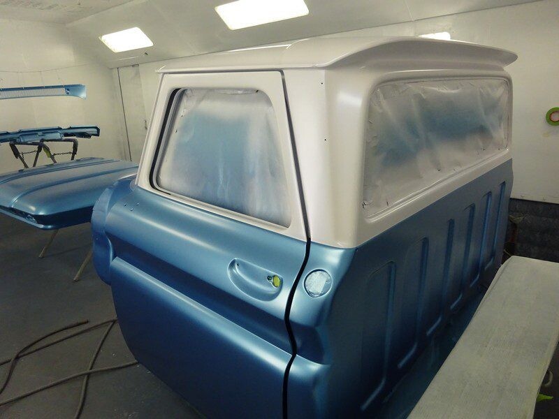 Blue classic car, freshly painted.