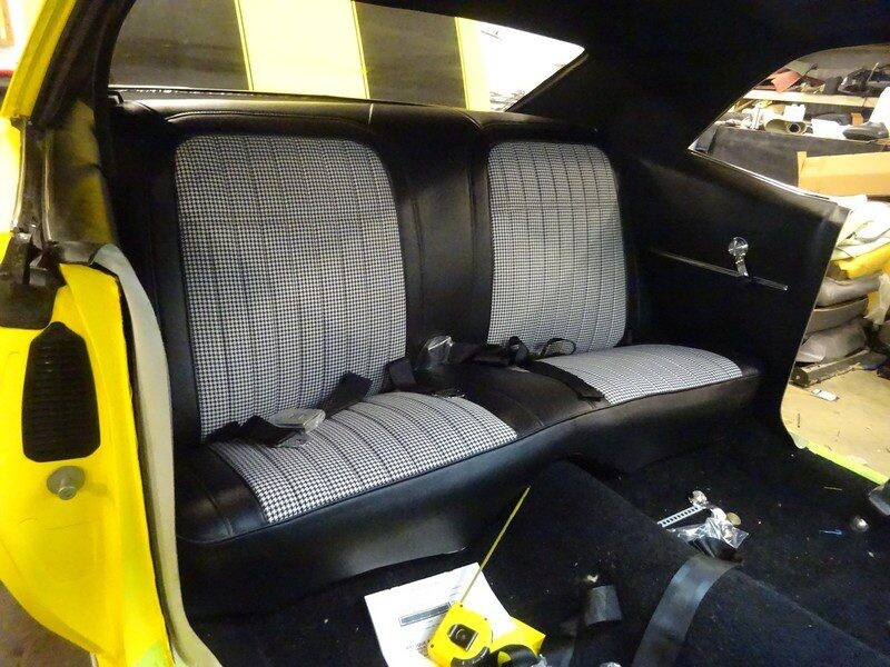 Yellow Camaro's houndstooth interior seats.