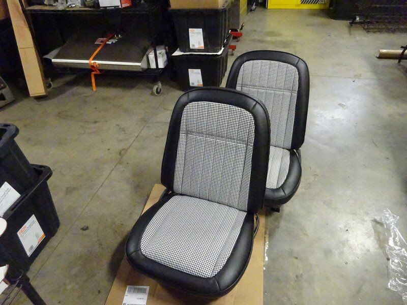 Pair of black and white checkered car seats.