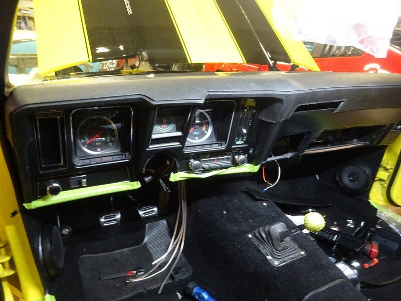 Yellow Camaro's dashboard under construction.