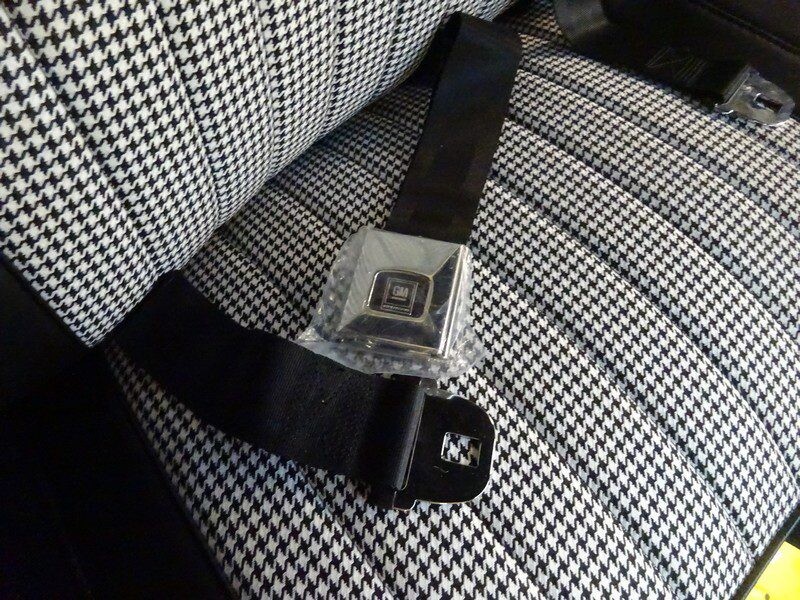 GM seatbelt on houndstooth seat.