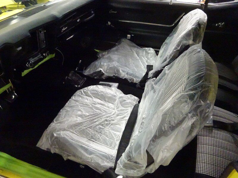 Classic Camaro interior, plastic-covered seats.