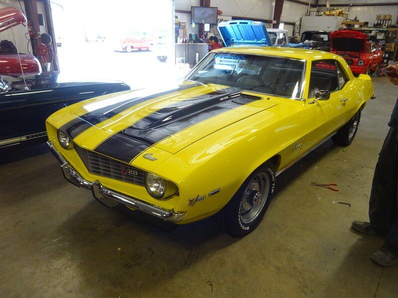 Yellow Camaro SS muscle car.